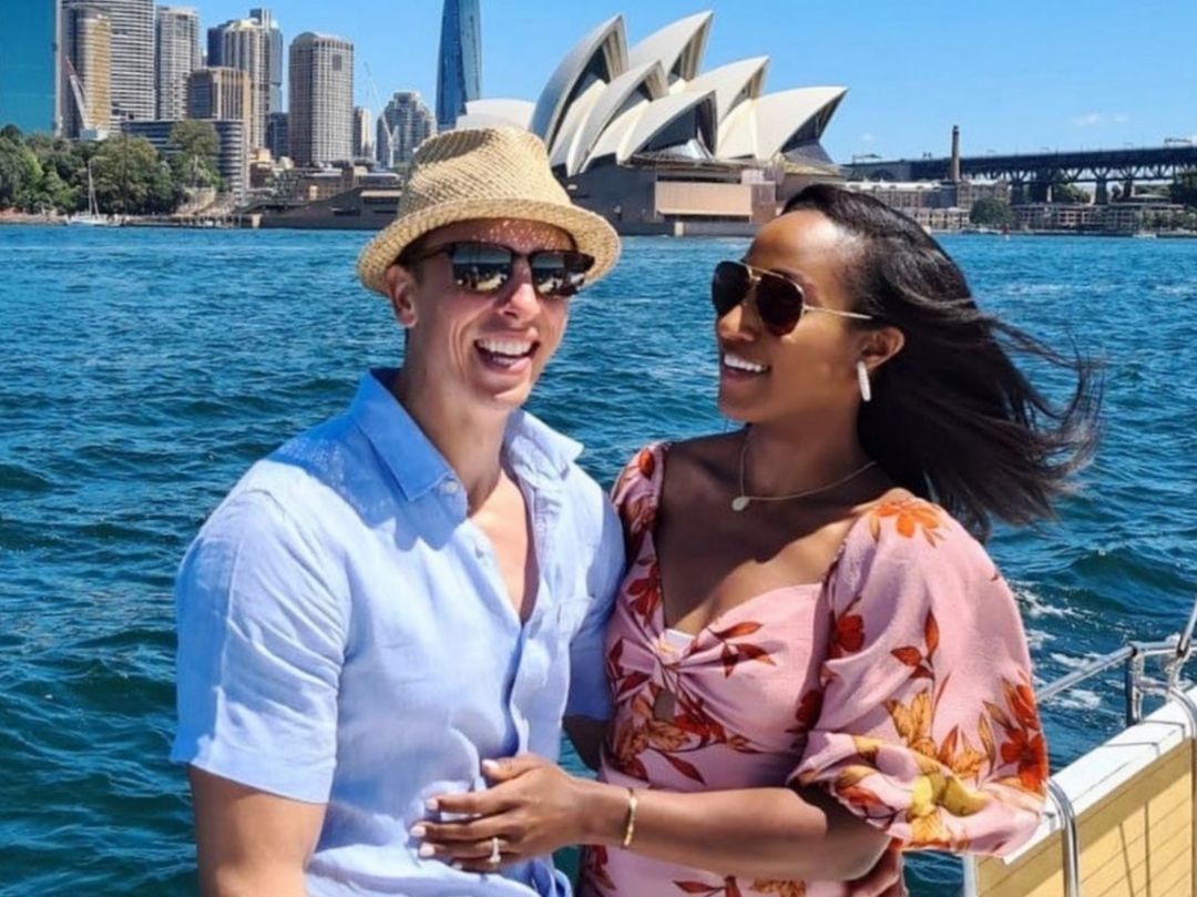 Engagement party boat cruise with happy couple with Sydney Opera House in the background